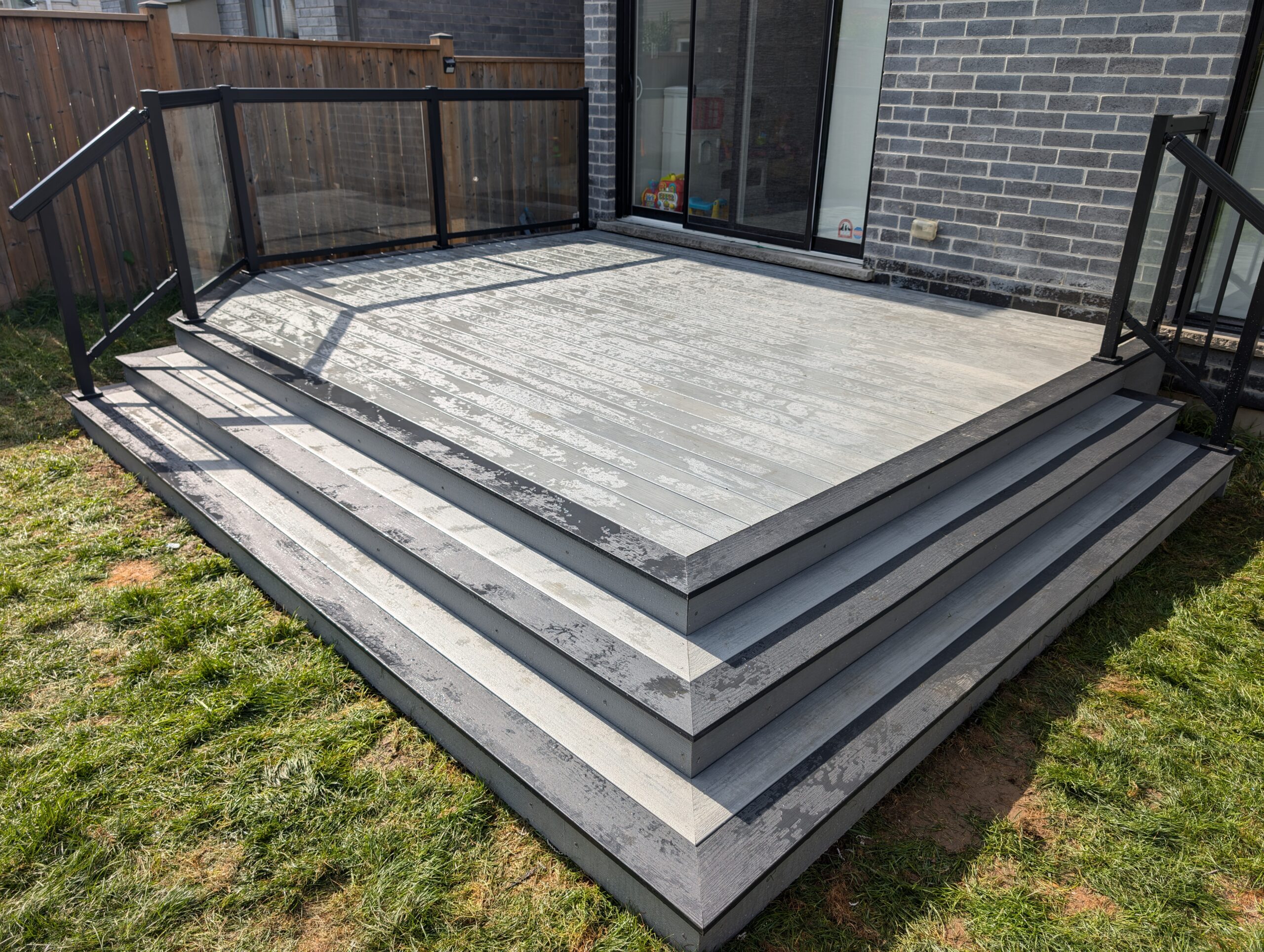 PVC and composite deck project by Augustine Construction
