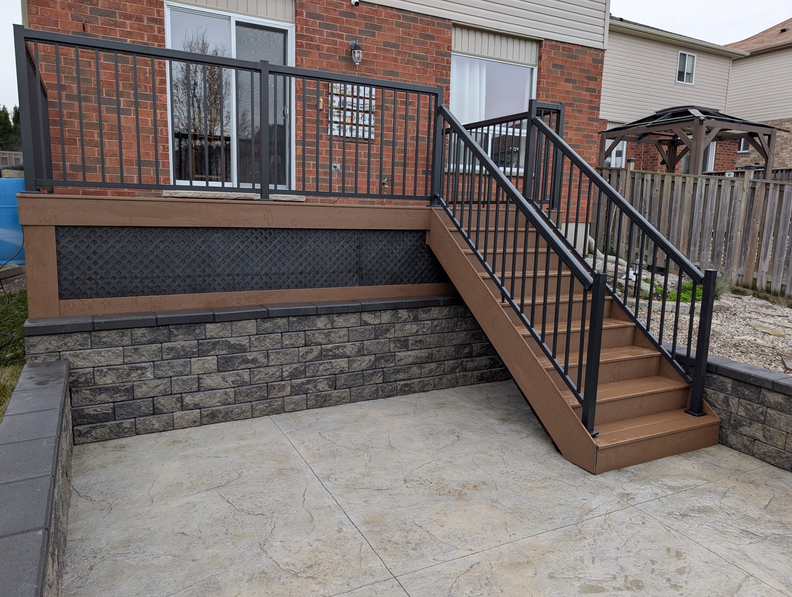 Finished deck project by Augustine Construction